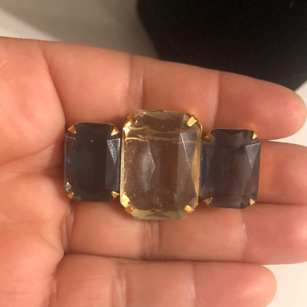 Gold And Black Elegant Brooch With Textured Design
